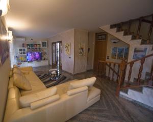 A television and/or entertainment centre at Villa Ivana