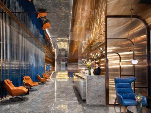 Posezení v ubytování Echarm PLUS International Hotel Zhujiang New Town Wuyangcun Metro Station - Free Deliver Service to Canton Fair Complex During Canton Fair Period