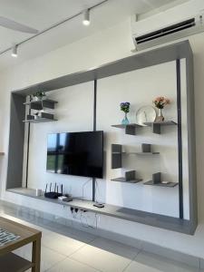 TV a/nebo společenská místnost v ubytování Traders garden c180