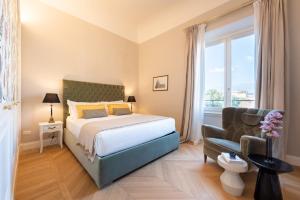 A bed or beds in a room at Apartments Florence- Granduca Penthouse