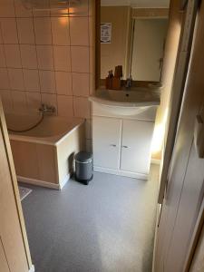 Koupelna v ubytování B&B De Notelaar + 31 fotografií