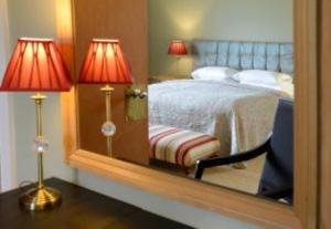 Postel nebo postele na pokoji v ubytování Mabie House Hotel + 1 fotografie