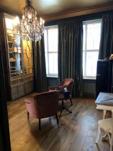 A seating area at Sint Andries Suites