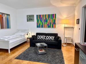 Postel nebo postele na pokoji v ubytování Apartments Mango Downtown