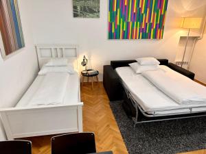 Postel nebo postele na pokoji v ubytování Apartments Mango Downtown