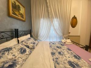 Postel nebo postele na pokoji v ubytování Fronte Fiera Apartment