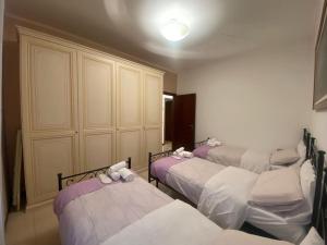 Postel nebo postele na pokoji v ubytování Fronte Fiera Apartment
