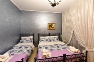 Postel nebo postele na pokoji v ubytování Fronte Fiera Apartment