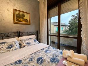 Postel nebo postele na pokoji v ubytování Fronte Fiera Apartment