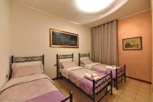 Postel nebo postele na pokoji v ubytování Fronte Fiera Apartment