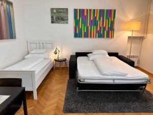 Postel nebo postele na pokoji v ubytování Apartments Mango Downtown