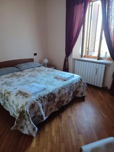 Postel nebo postele na pokoji v ubytování Casa Belvedere