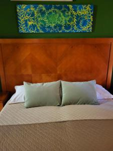 Postel nebo postele na pokoji v ubytování Hotel Federico II