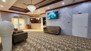 TV a/nebo společenská místnost v ubytování Ruwi Beach Hotel Apartments - MAHA HOSPITALITY GROUP