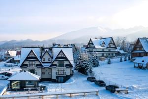 Royal Apartments & Spa Zakopane-Cyrhla v zime