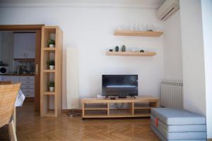 A television and/or entertainment centre at Flat with parking in the center of Las Rozas