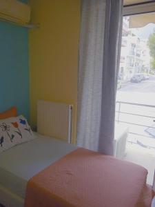 A bed or beds in a room at Demy's apartment