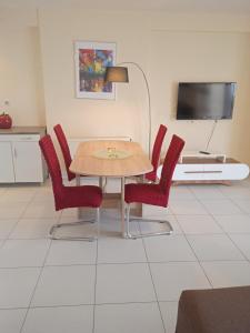 A television and/or entertainment centre at Demy's apartment
