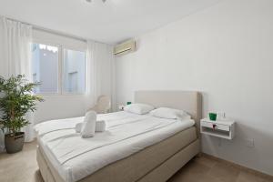 Voodi või voodid majutusasutuse Cozy apartment in Benalmadena Ref 165 toas