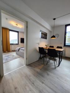 Postel nebo postele na pokoji v ubytování City 2 - Stilvolles Appartement + 3 fotografie