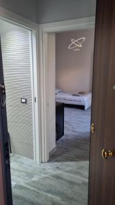 Posteľ alebo postele v izbe v ubytovaní Centonze Apt - Messina centro
