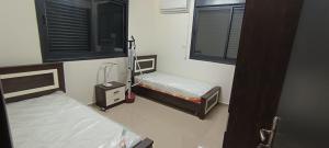 Ένα ή περισσότερα κρεβάτια σε δωμάτιο στο Masion Lovely Home