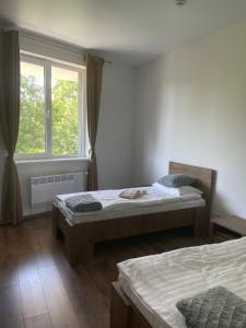 Hotel Dovha客房内的一张或多张床位