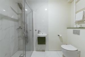 Baðherbergi á Hotel Švicarija - Terme Dobrna