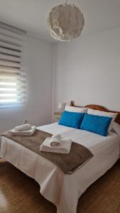 Postel nebo postele na pokoji v ubytování Apartamento Baeza Cózar 1