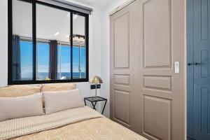 Кровать или кровати в номере Sea view - 5min Monaco - Swimming pool