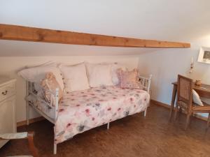 Postel nebo postele na pokoji v ubytování Le Couvent