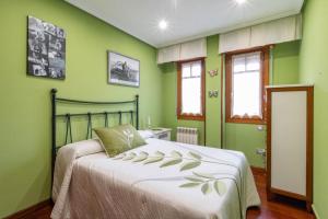 Postel nebo postele na pokoji v ubytování Coqueto piso en Ampuero