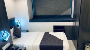 Postel nebo postele na pokoji v ubytování Hotel Larmont Luxury