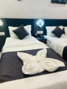 Postel nebo postele na pokoji v ubytování Hotel Larmont Luxury