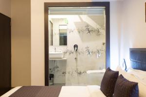 Koupelna v ubytování Hotel Larmont Luxury