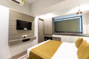 Postel nebo postele na pokoji v ubytování Hotel Larmont Luxury