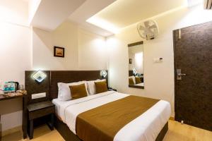 Postel nebo postele na pokoji v ubytování Hotel Larmont Luxury
