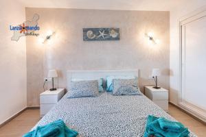 Postel nebo postele na pokoji v ubytování Vivienda Vacacional Papillon