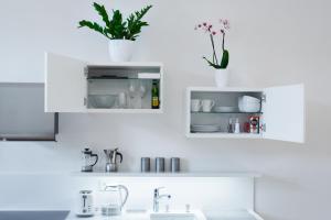 Kuchyň nebo kuchyňský kout v ubytování Beautiful Mala Strana Studio by easyBNB