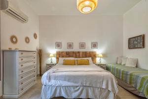 Postel nebo postele na pokoji v ubytování Affittacamere da Marianna + 37 fotografií