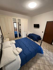 Кровать или кровати в номере Villa Gianna