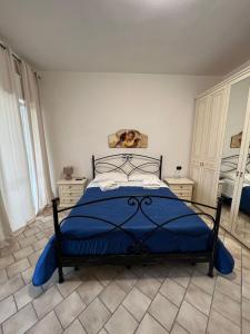 Кровать или кровати в номере Villa Gianna