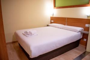 Postel nebo postele na pokoji v ubytování Apartamentos Princesa Park 3000