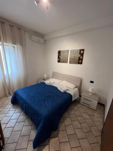 Кровать или кровати в номере Villa Gianna