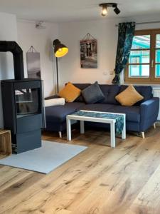 Posezení v ubytování Charmante farbenfrohe Wohnung für zwei