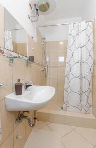 Koupelna v ubytování Apartments Anastazija + 28 fotografií