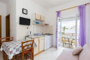 Kuchyň nebo kuchyňský kout v ubytování Apartments Anastazija
