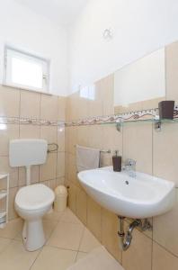 Koupelna v ubytování Apartments Anastazija
