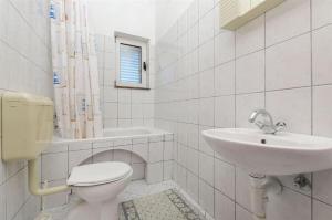 Koupelna v ubytování Apartments Nada + 24 fotografií