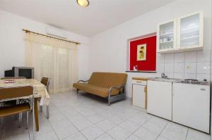 Kuchyň nebo kuchyňský kout v ubytování Apartments Nada
